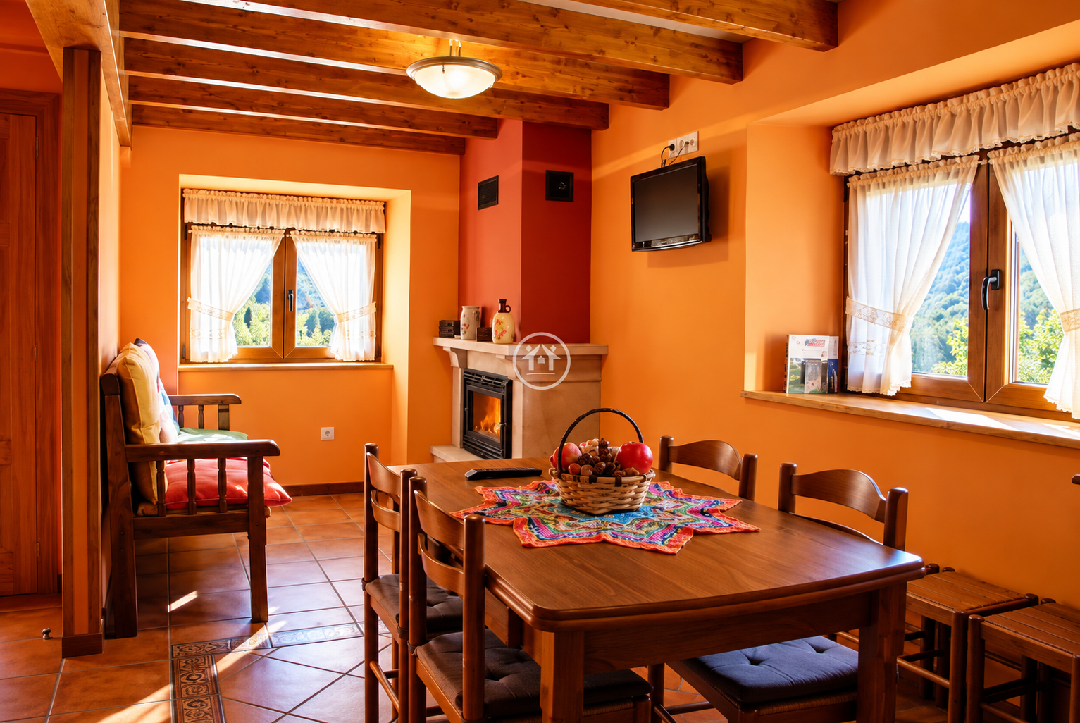 Salón con chimenea de Casa Jamín